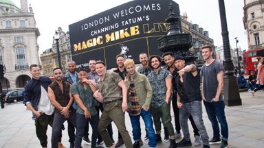 Channing Tatum pictured with dancers from Magic Mike Live in Piccadilly Circus, London, as the giant screens welcome the show to the capital.